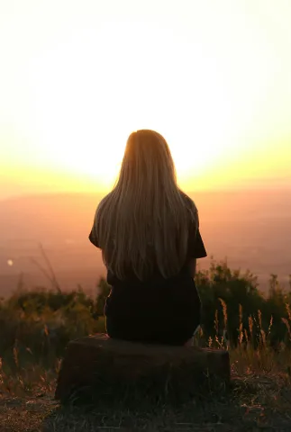 A lonely woman thinking.